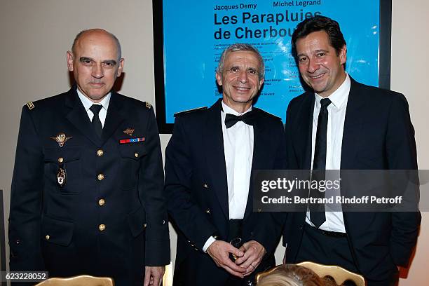 Army General, Jean-Regis Vechambre, Bandmaster of the event, Francois Boulanger and humorist Laurent Gerra attend the 24th "Gala de l'Espoir" at...