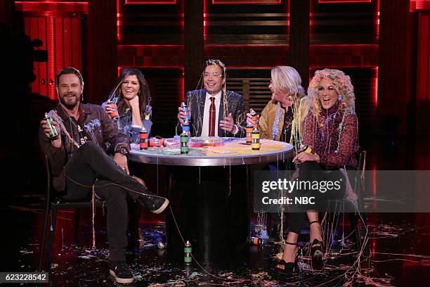 Episode 0570 -- Pictured: Karen Fairchild, Jimi Westbrook, Phillip Sweet, and Kimberly Schlapman of musical guest Little Big Town play "Stranger...