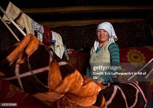 Kyrgyz woman near Karakul lake, Xinjiang Uyghur Autonomous Region, China on September 21, 2012 in Karakul Lake, China.