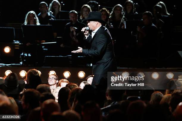 Garth Brooks performs onstage during the 50th annual CMA Awards at the Bridgestone Arena on November 2, 2016 in Nashville, Tennessee.