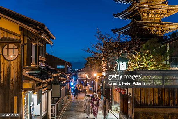 street scene kyoto at night with yasaka temple - yasaka shrine stock pictures, royalty-free photos & images