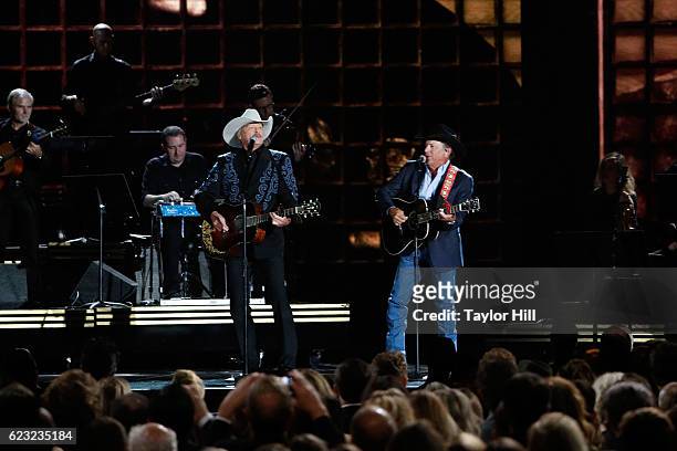 Alan Jackson and George Strait perform onstage during the 50th annual CMA Awards at the Bridgestone Arena on November 2, 2016 in Nashville, Tennessee.