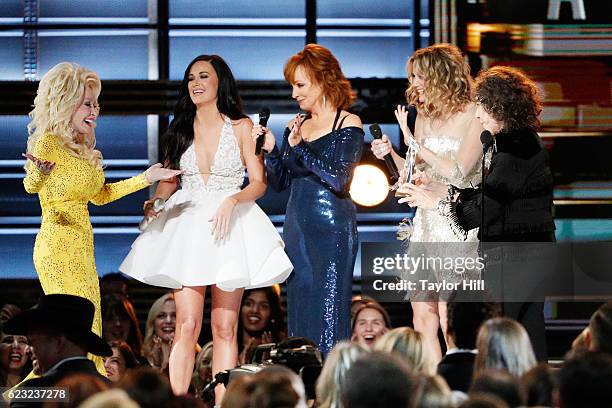 Dolly Parton, Kacey Musgraves, Reba McEntire, Jennifer Nettles, and Lily Tomlin appear onstage during the 50th annual CMA Awards at the Bridgestone...