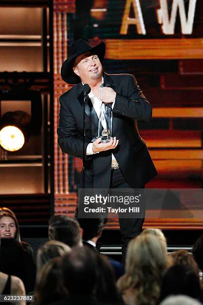 Garth Brooks accepts an award onstage during the 50th annual CMA Awards at the Bridgestone Arena on November 2, 2016 in Nashville, Tennessee.