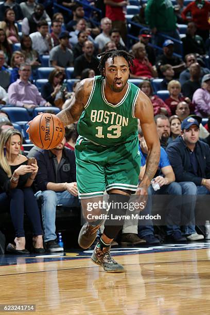 James Young of the Boston Celtics handles the ball during the game against the New Orleans Pelicans on November 14, 2016 at Smoothie King Center in...