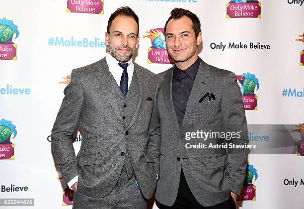 Actors Jonny Lee Miller and Jude Law attend 2016 Only Make Believe Gala at St James Theater on November 14, 2016 in New York City.