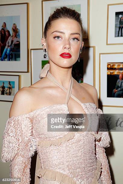 Model/actress Amber Heard poses in the green room at Glamour Women Of The Year 2016 at NeueHouse Hollywood on November 14, 2016 in Los Angeles,...