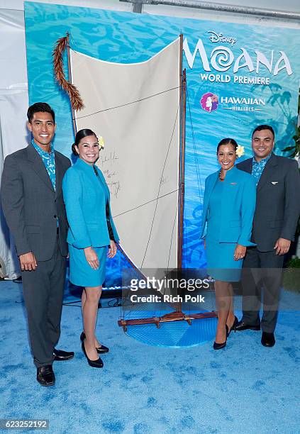Hawaiian Airlines promo team pose with the sail at the Hawaiian Airlines booth at the world premiere of Disney's "Moana" at the El Capitan Theatre on...
