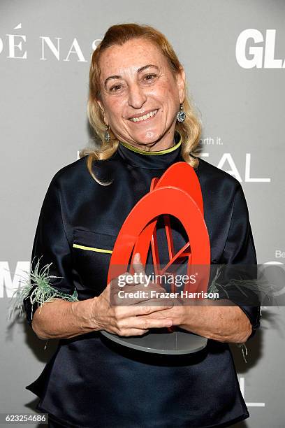 Honoree Muccia Prada poses with an award at Glamour Women Of The Year 2016 at NeueHouse Hollywood on November 14, 2016 in Los Angeles, California.