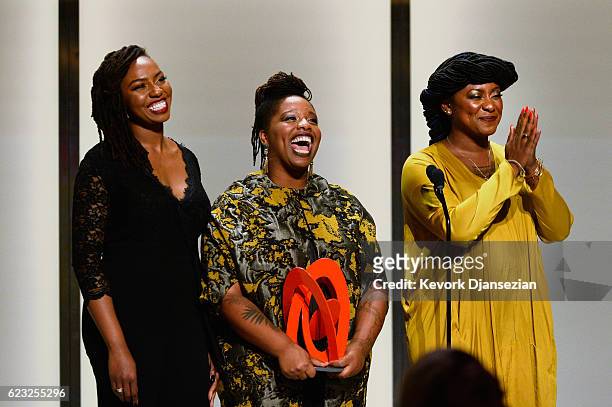 Honorees Opal Tometi, Patrisse Cullors, and Alicia Garza accept an award onstage during Glamour Women Of The Year 2016 at NeueHouse Hollywood on...