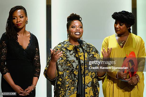 Honorees Opal Tometi, Patrisse Cullors, and Alicia Garza accept an award onstage during Glamour Women Of The Year 2016 at NeueHouse Hollywood on...