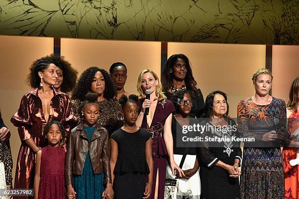 Actress Tracee Ellis Ross, producer Shonda Rhimes, actress Elizabeth Banks, civil rights activist Dolores Huerta and honorees speak onstage during...