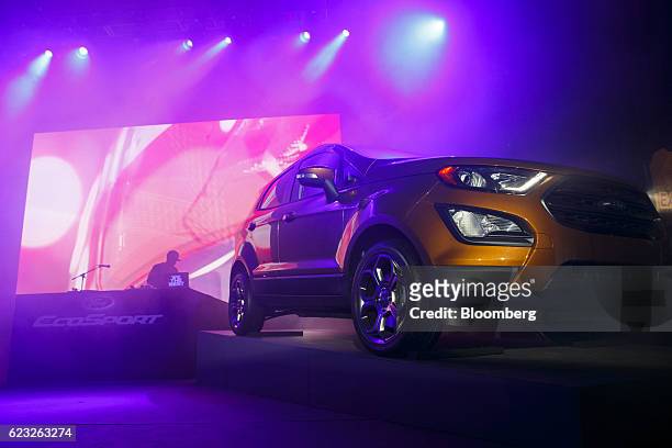 The Ford Motor Co. EcoSport crossover sport utility vehicle sits on display after being revealed on stage during the Go Small, Live Big event in Los...