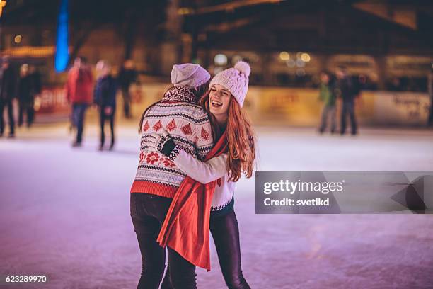 can't stop laughing with you - learning to ice skate stock pictures, royalty-free photos & images