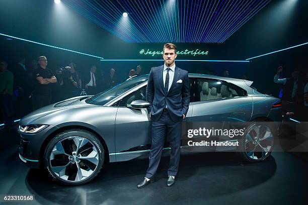 Professional baseball player Bryce Harper with the Jaguar I-PACE Concept, an all-electric performance SUV, ahead of its global debut at the Los...