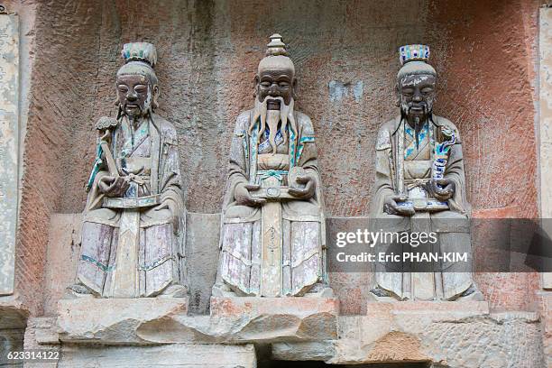 dazu rock carvings, sichuan, china - dazu rock carvings - fotografias e filmes do acervo