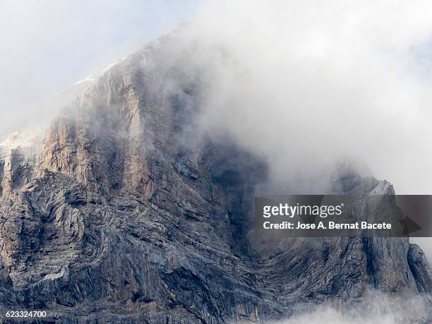 close up of the top of a mountain of metamorphic rock over 3144 meters - buttress stock pictures, royalty-free photos & images