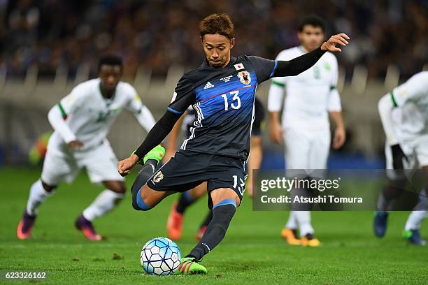 Hiroshi Kiyotake of Japan converts the penalty to score his team's first goal during the 2018 FIFA World Cup Qualifier match between Japan and Saudi...