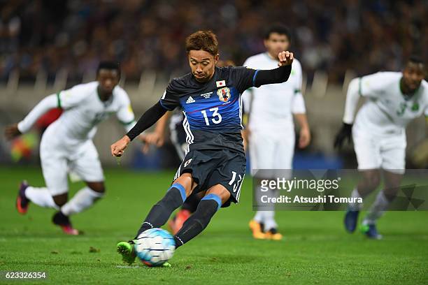 Hiroshi Kiyotake of Japan converts the penalty to score his team's first goal during the 2018 FIFA World Cup Qualifier match between Japan and Saudi...