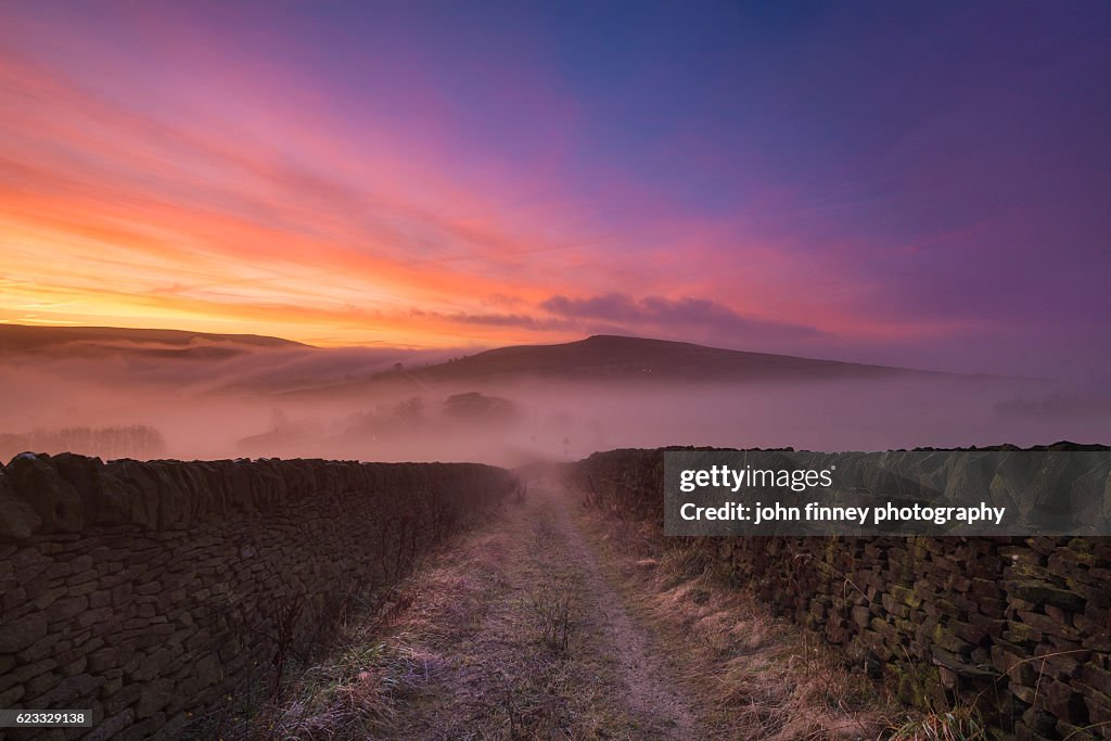 Sunrise in Derbyshire on Remembrance Sunday. English Peak District. UK.