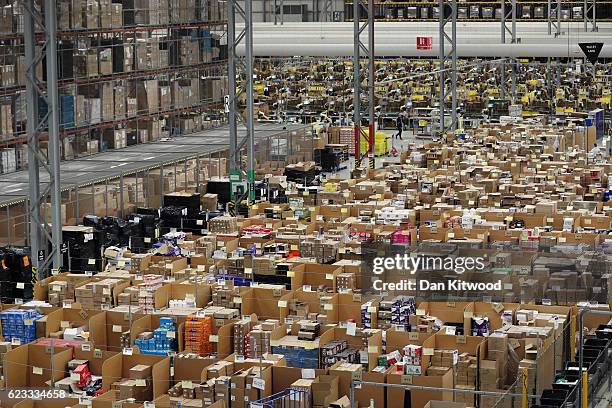 Parcels are processed and prepared for dispatch at Amazon's fulfillment centre on November 15, 2016 in Peterborough, England. In the lead up to...