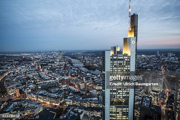 The Frankfurt banking district in the Blue Hour. The photo shows the head office of Commerzbank AG and a part of Frankfurt with the river Main. Main.