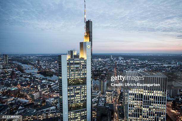 The Frankfurt banking district in the Blue Hour. The photo shows the head office of Commerzbank AG and a part of Frankfurt with the river Main. Main.