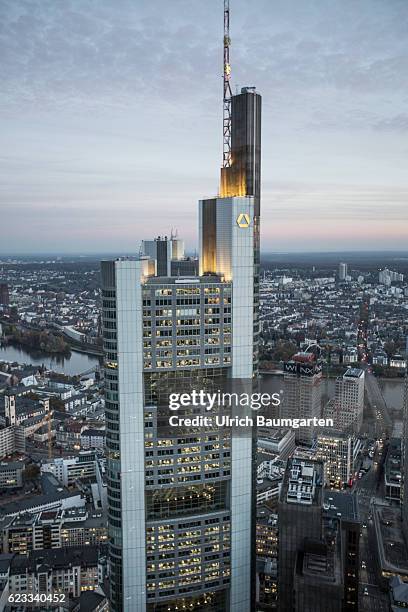 The Frankfurt banking district in the Blue Hour. The photo shows the head office of Commerzbank AG and a part of Frankfurt with the river Main. Main.