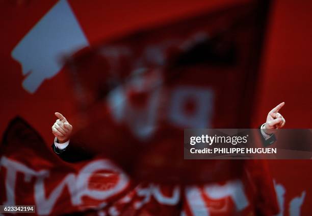 French Front de Gauche leftist candidate for the 2012 French presidential election, Jean-Luc Melenchon delivers a speech during a campaign meeting,...