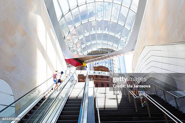 staircase and escalator to the new underground subway sydney australia - barangaroo stock pictures, royalty-free photos & images