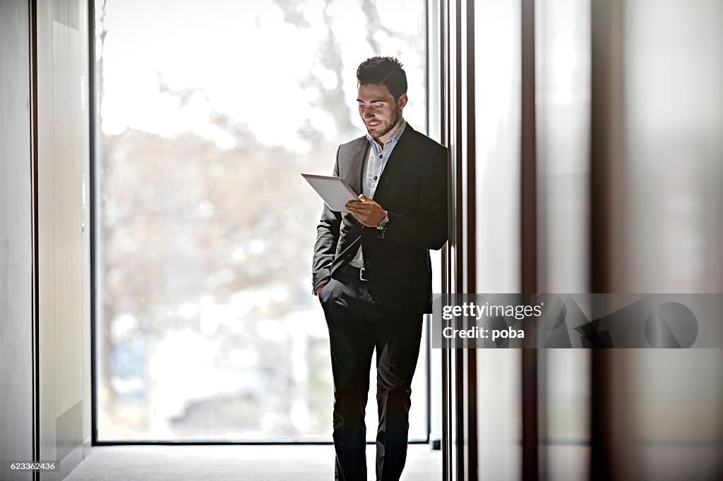 Businessman working on a business trip at the hotel