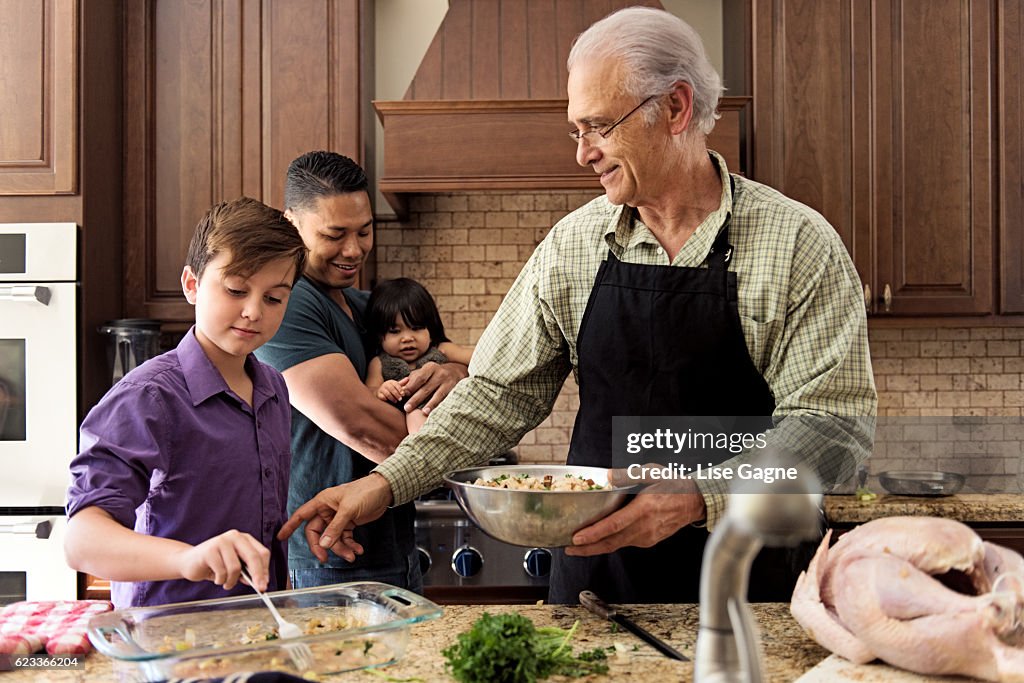 Blended Family preparing thanksgiving dinner together