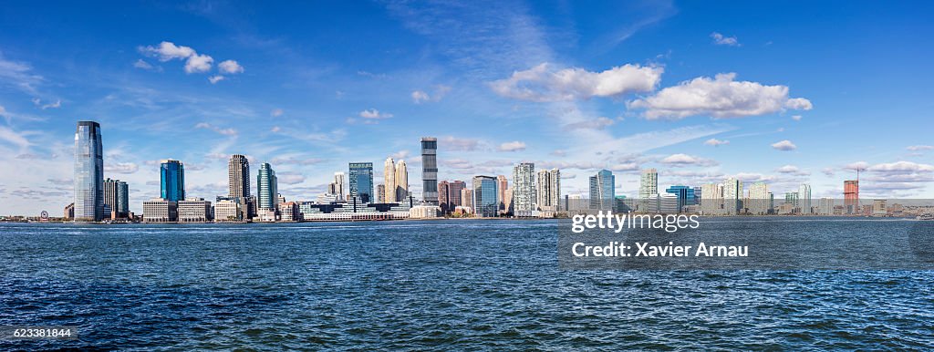 Panoramic view of urban skyline of Newport by river