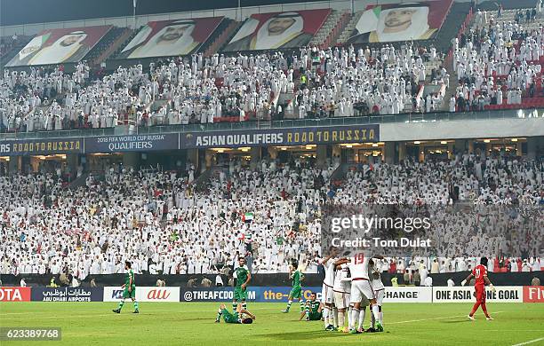 Ismail Matar of UAE celebrates with the team scoring his sides second goal during the 2018 FIFA World Cup Qualifier match between UAE and Iraq at...