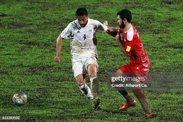 Omid Ebrahimi of Iran competes for the ball during the 2018 FIFA World Cup Qualifier match between Iran and Syria at Tuanku Abdul Rahman Stadium on...