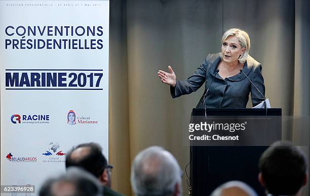President of French far-right Front National party Marine Le Pen delivers a speech during a meeting on the theme "Suburbs: for the return of the...
