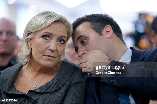 President of French far-right Front National party Marine Le Pen and FN's vice-president Florian Philippot attend a meeting on the theme '"Suburbs:...