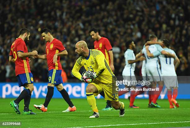 Pepe Reina of Spain looks dejected as Adam Lallana of England scores their first goal from the penalty spot during the international friendly match...