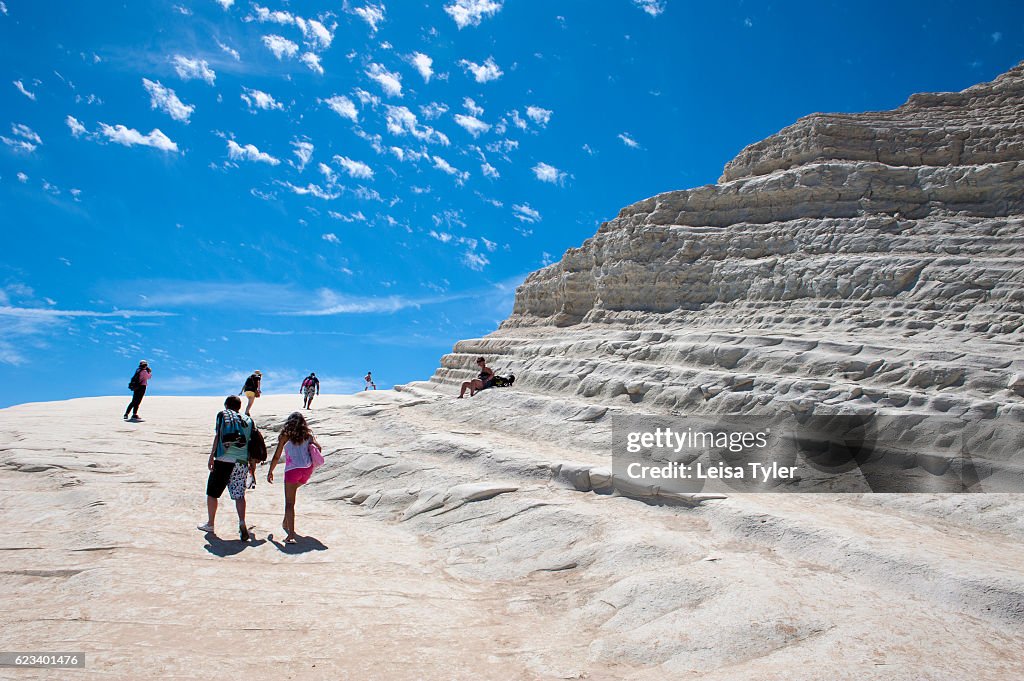 Visitors to Scala dei Turchi, or Stairs of the Turks, at...