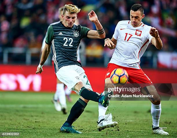 Maximilian Philipp from Germany fights for the ball with Jaroslaw Jach from Poland during the International Friendly soccer match between Poland U-21...