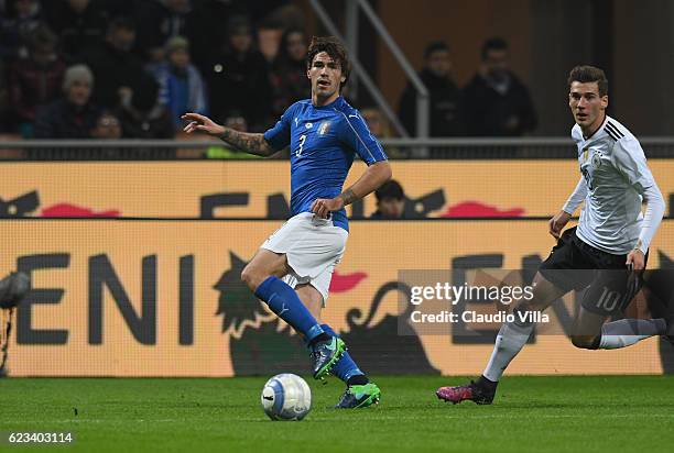 Alessio Romagnoli of Italy fights for the ball with Leon Goretzka of Germany during the International Friendly Match between Italy and Germany at...