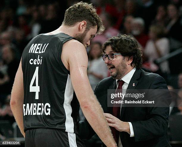 Andrea Trincheri, Head Coachand Nicolo Melli, #4 of Brose Bamberg in action during the 2016/2017 Turkish Airlines EuroLeague Regular Season Round 7...