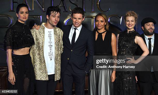 Katherine Waterston, Ezra Miller, Eddie Redmayne, J. K. Rowling, Carmen Ejogo, Alison Sudol and Dan Fogler attend the European premiere of "Fantastic...