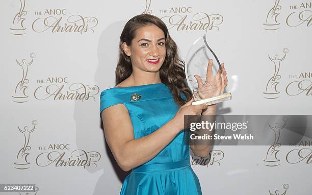 Majlinda Kelmendi of Kosvo poses with the award for the Kosovo Olympic Committee during The ANOC Awards 2016 at the The Qatar National Convention...