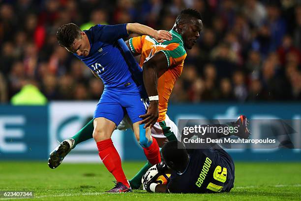 Kevin Gameiro of France battles for the ball with i4 and Goalkeeper, Sylvain Gbohouo of The Ivory Coast during the International Friendly match...