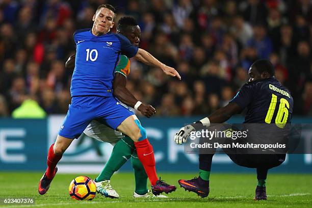 Kevin Gameiro of France battles for the ball with Lamine Kone and Goalkeeper, Sylvain Gbohouo of The Ivory Coast during the International Friendly...