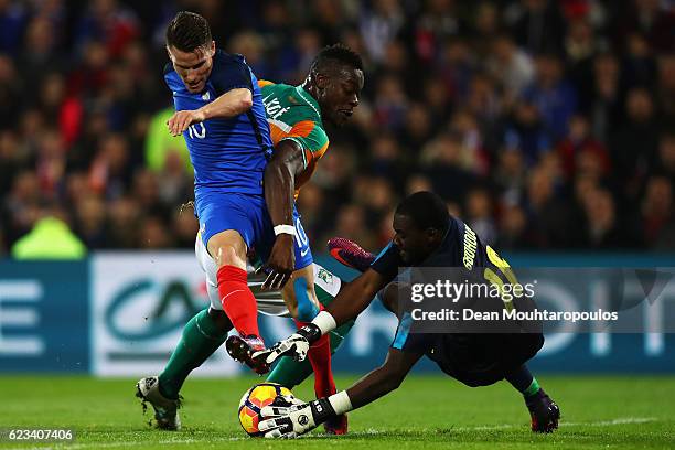 Kevin Gameiro of France battles for the ball with Lamine Kone and Goalkeeper, Sylvain Gbohouo of The Ivory Coast during the International Friendly...