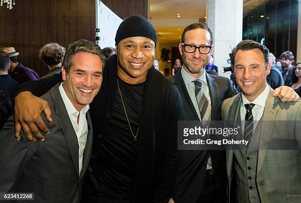 Morgan Wandell, LL Cool J, Richard Weitz and guest arrive for the Saban Community Clinic's 40th Annual Dinner Gala at The Beverly Hilton Hotel on...