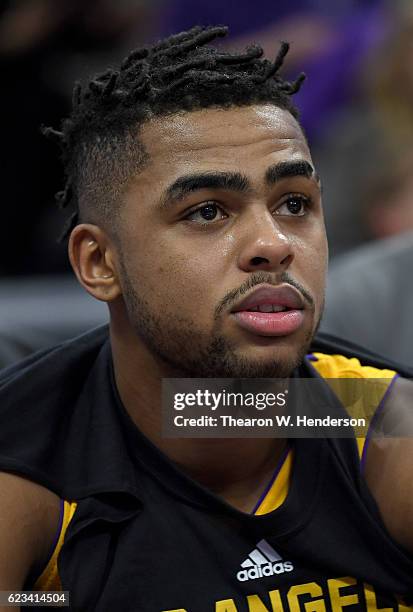 Angelo Russell of the Los Angeles Lakers looks on from the bench against the Sacramento Kings during an NBA basketball game at Golden 1 Center on...