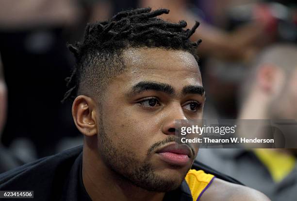 Angelo Russell of the Los Angeles Lakers looks on from the bench against the Sacramento Kings during an NBA basketball game at Golden 1 Center on...